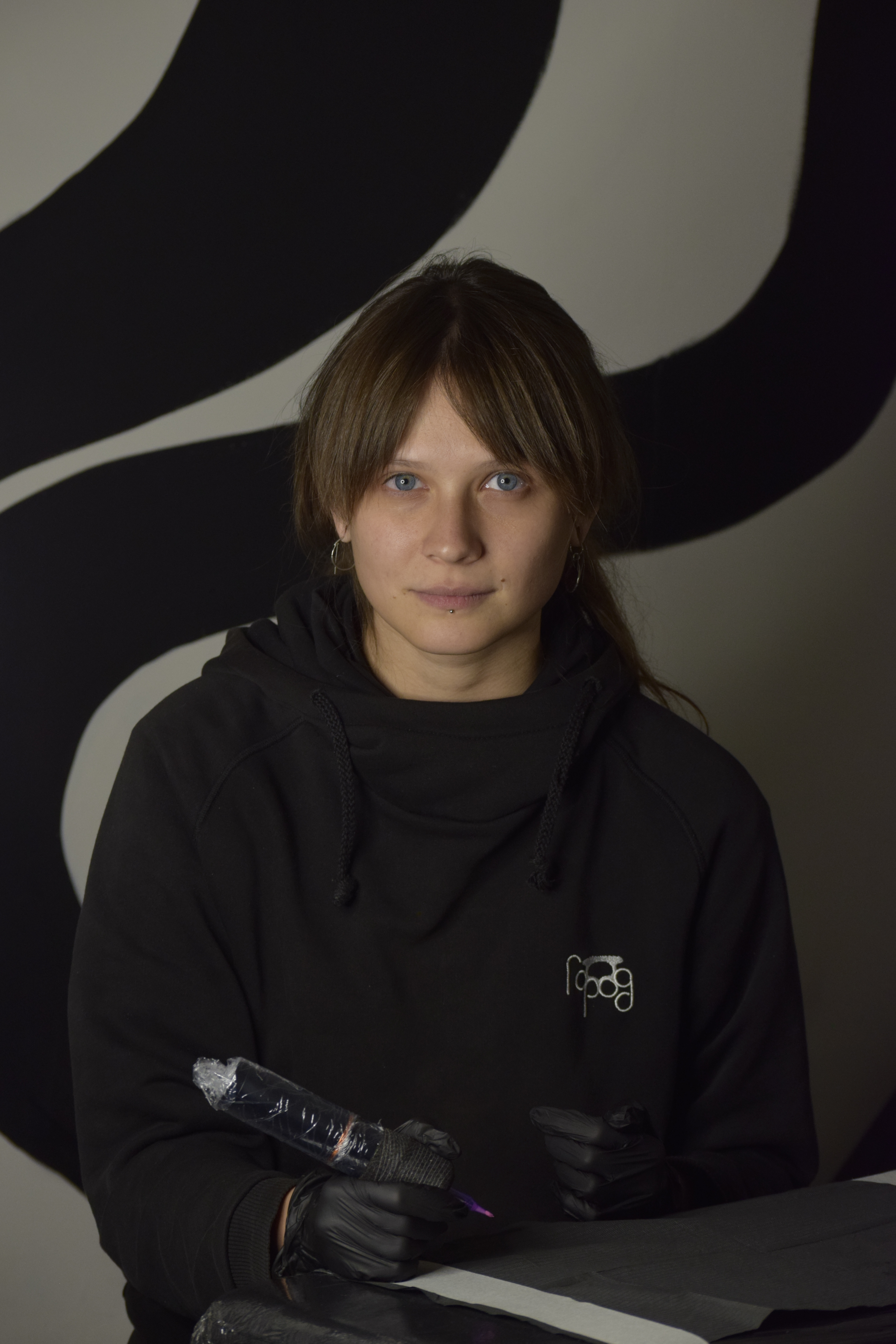 Placeholder portrait — replace with a photo of Dina, tattoo artist at Studio 21 Tattoo Yerevan specializing in microrealism and minimalist work.